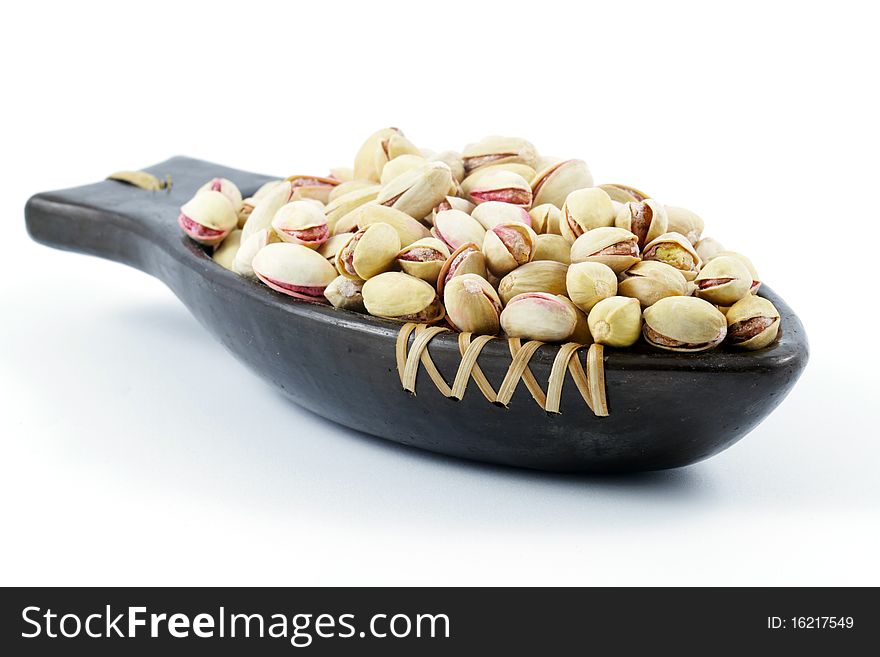 Roasted Pistachio nuts served in a dish