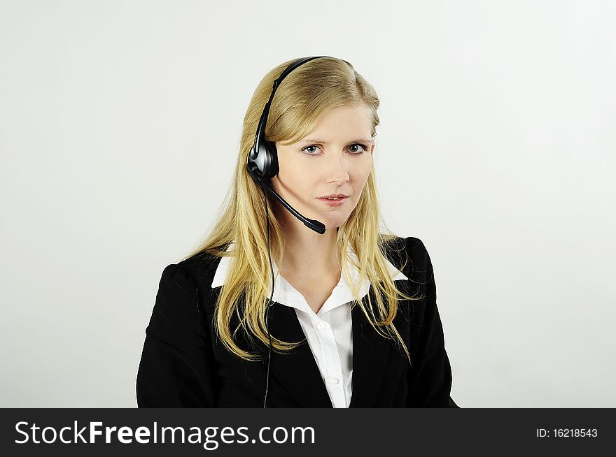 Beauty blond woman with headset. Beauty blond woman with headset
