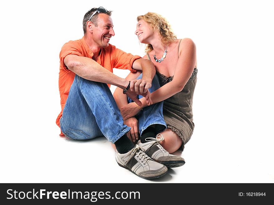 Romantic young couple in front of white background. Romantic young couple in front of white background