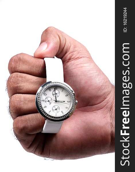 Hand holding branded wrist watch. Hand holding branded wrist watch.