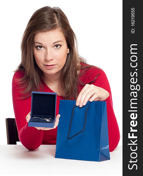 Women holding a luxury jewelry in box with white background