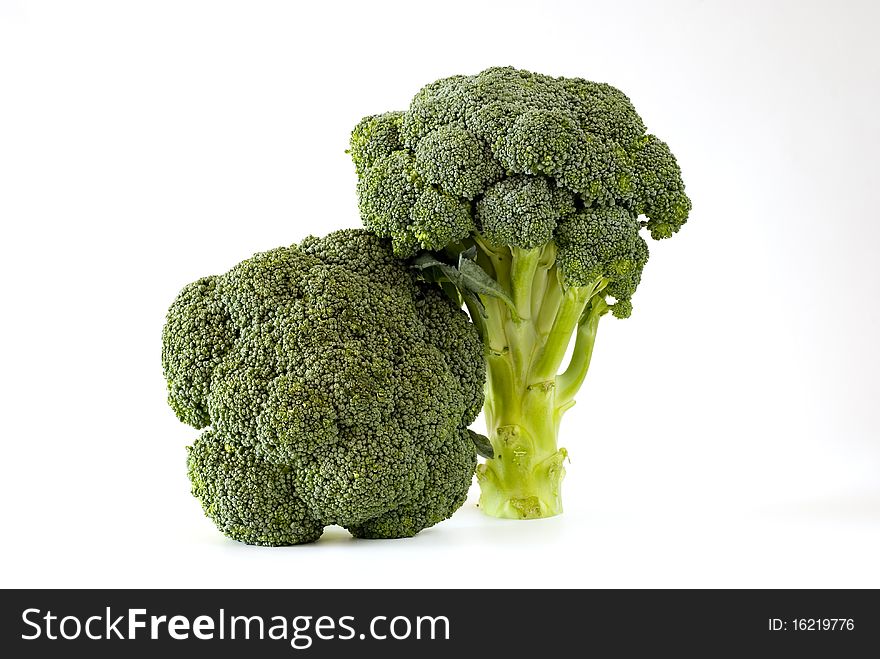 Fresh green sprouting broccoli on the white background. Fresh green sprouting broccoli on the white background