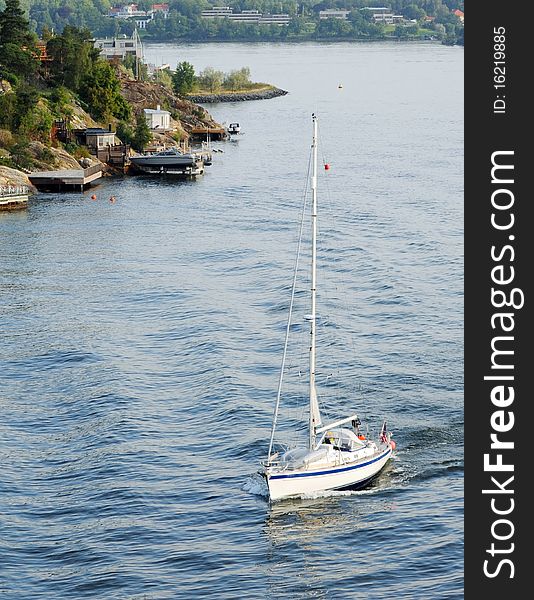 Yacht sailinng past Sweden coastline