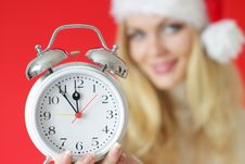 Santa Girl Holding Alarm Clock Royalty Free Stock Photography Santa Girl Holding Alarm Clock Royalty Free Stock Photography