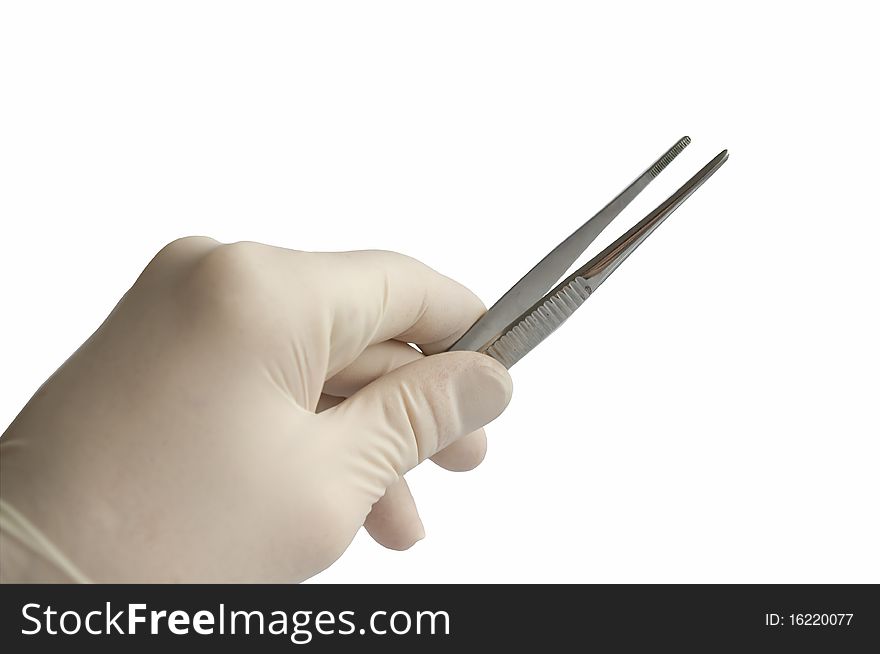Hand with tweezers on a white background