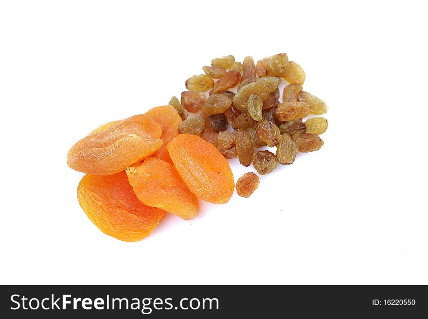 Peaches and raisins isolated on white background.