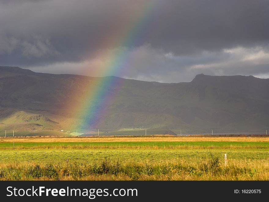 Rainbow in the mountains around Vik. Rainbow in the mountains around Vik