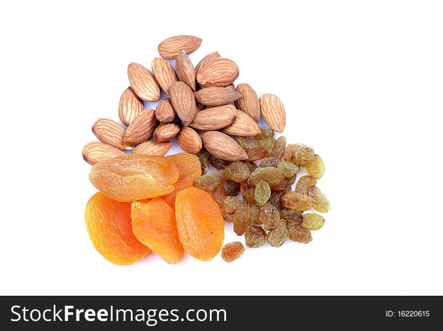 Peaches, raisins and almond isolated on white background. Peaches, raisins and almond isolated on white background.