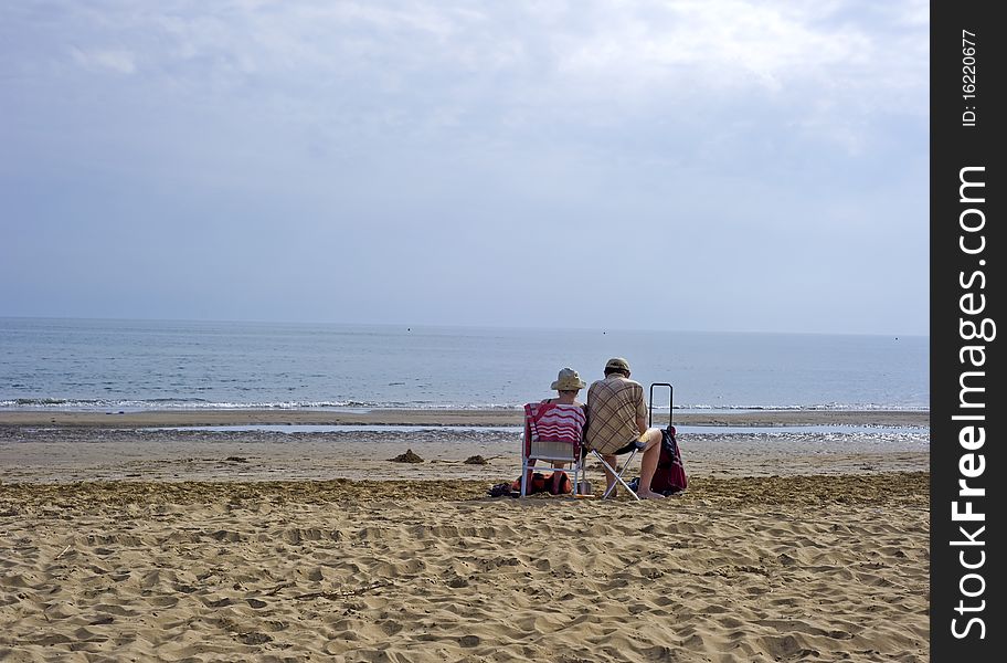 Portrait with old couple staying together on seashore. Portrait with old couple staying together on seashore