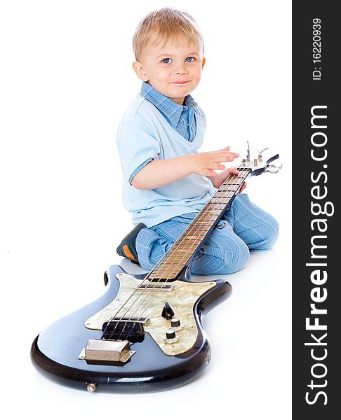 Little boy with guitar