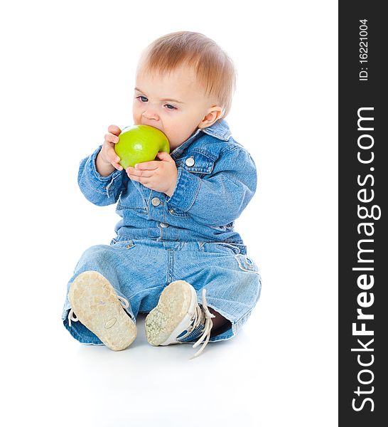 Baby with green apple. Isolated on white background