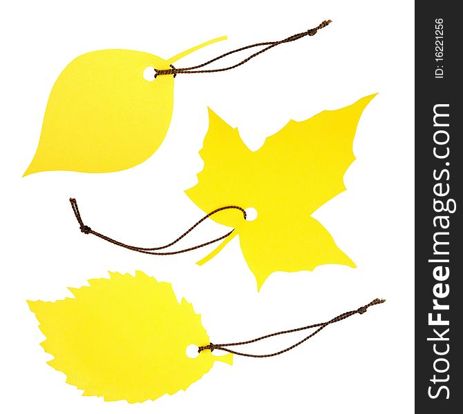 Collage of three yellow leaf-shaped dockets tied with brown string, isolated on white. Collage of three yellow leaf-shaped dockets tied with brown string, isolated on white