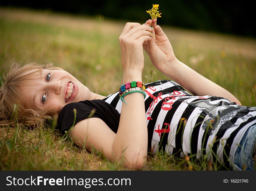 Teenage Girl With A Flower