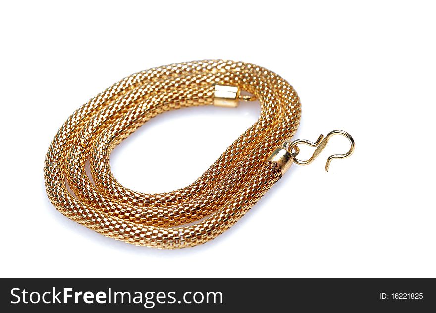 Gold chain jewellery isolated on white backgground.