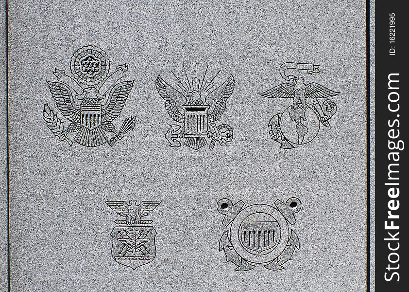 Different military service groups, set in stone outside the Capitol