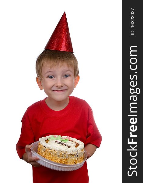 Happy boy with a cake on a white background