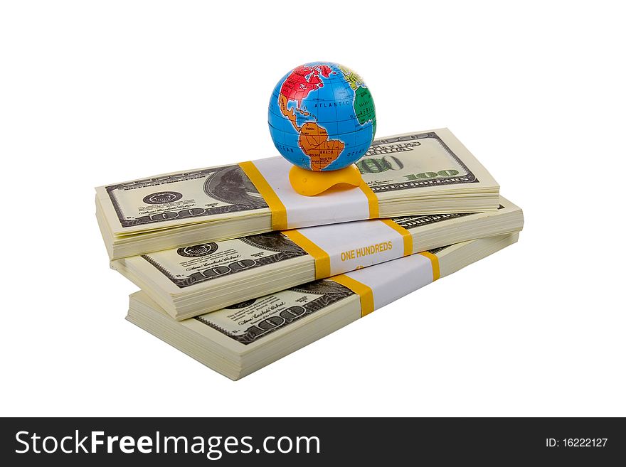 Globe on stacks of dollars isolated on a white background