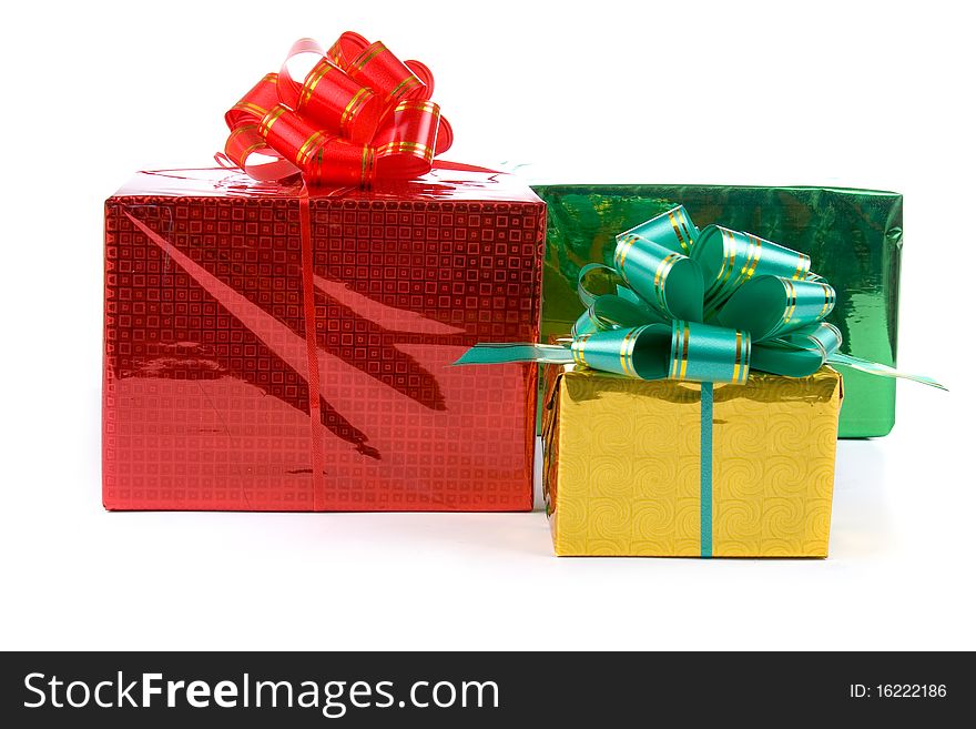 Multi-colored boxes with presents isolated on white background