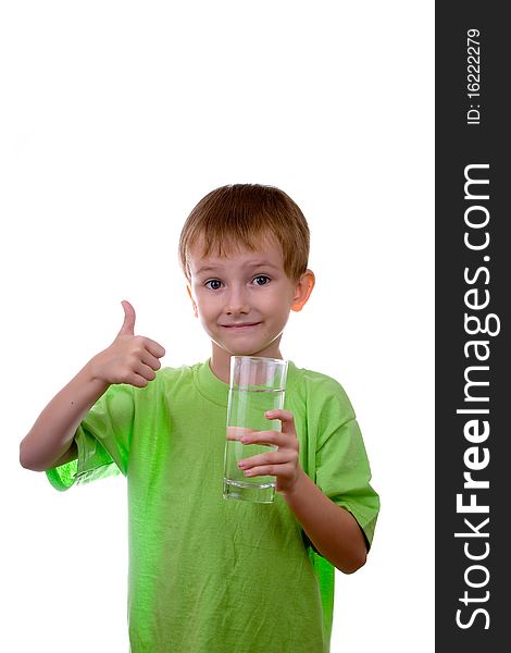Boy with a glass of water on a white background