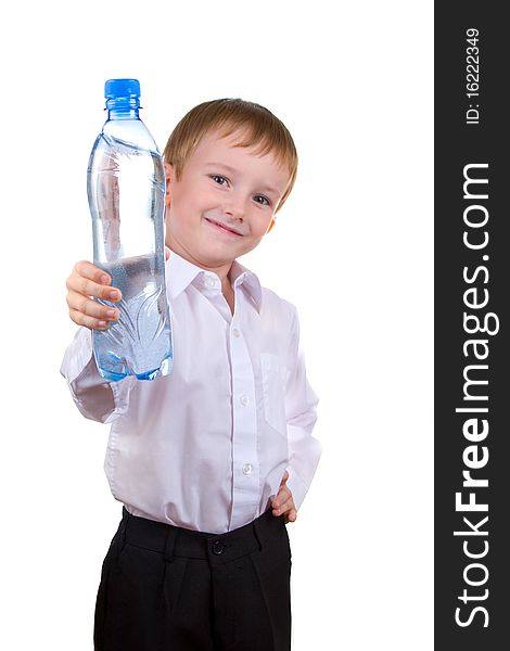 Happy boy with a bottle of water on a white background