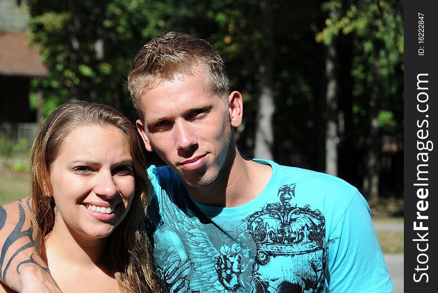 Male and female siblings are enjoying time together in the summertime.