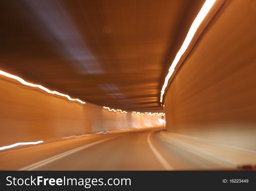 A shot taken in a tunnel when driving in high speed. A shot taken in a tunnel when driving in high speed