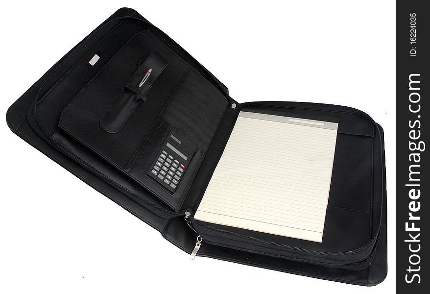 Black briefcase with hand holder metal lock white paper calculator and pen. Black briefcase with hand holder metal lock white paper calculator and pen