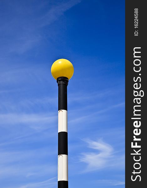 Traditional Zebra Crossing pole with yellow beacon. Traditional Zebra Crossing pole with yellow beacon