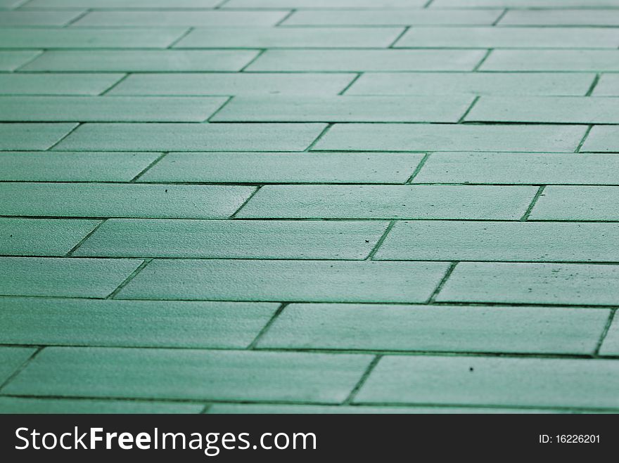 Green floor at resort near beach