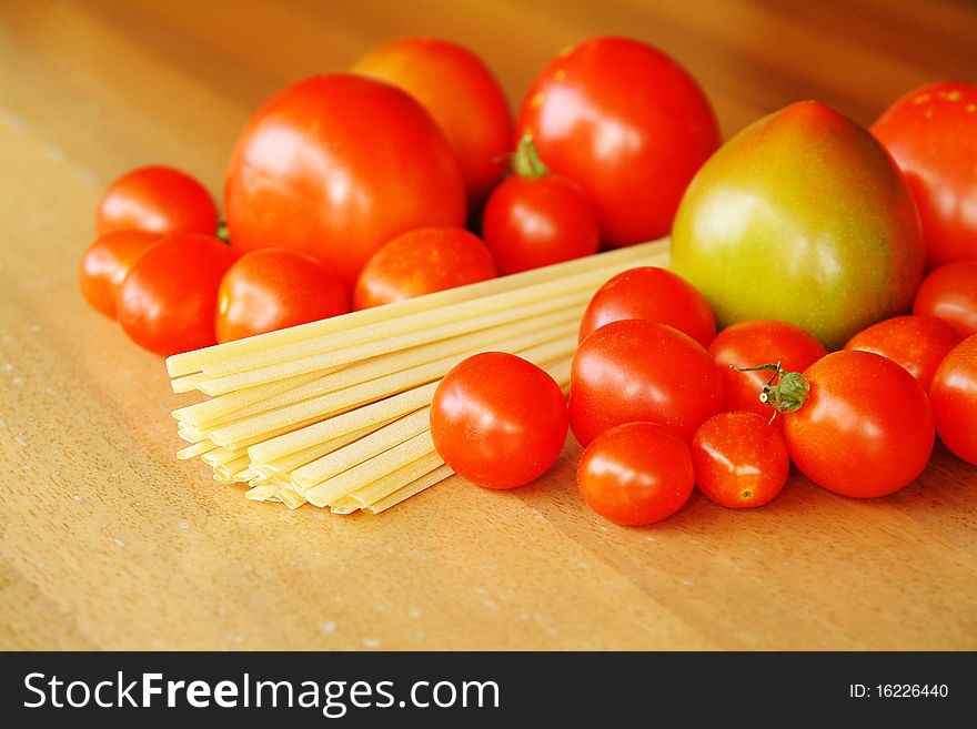 Tomatoes and pasta on the table