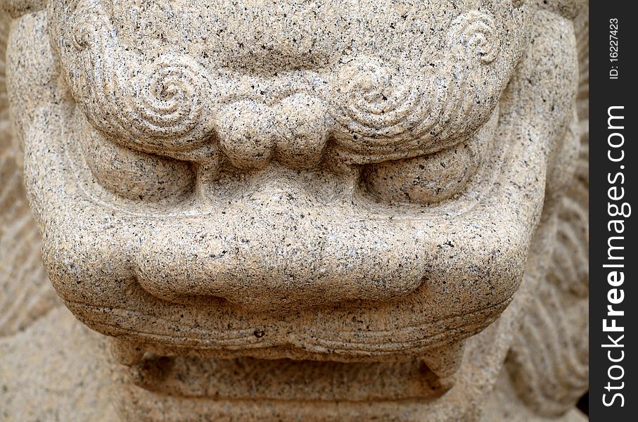 Close up shot of Chinese stone dragon sentinel