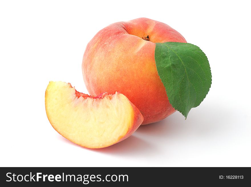 Red juicy peach and segment isolated on white. Red juicy peach and segment isolated on white