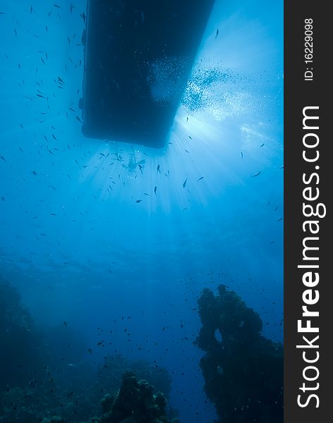 Underwater View Of Boat Silhouette.