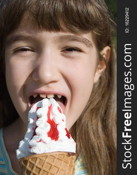 Smiling girl with big ice-cream