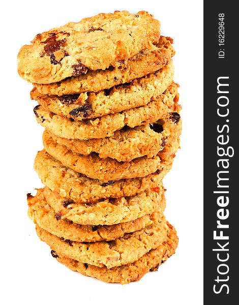 A stack of oat cookies on a white background. A stack of oat cookies on a white background