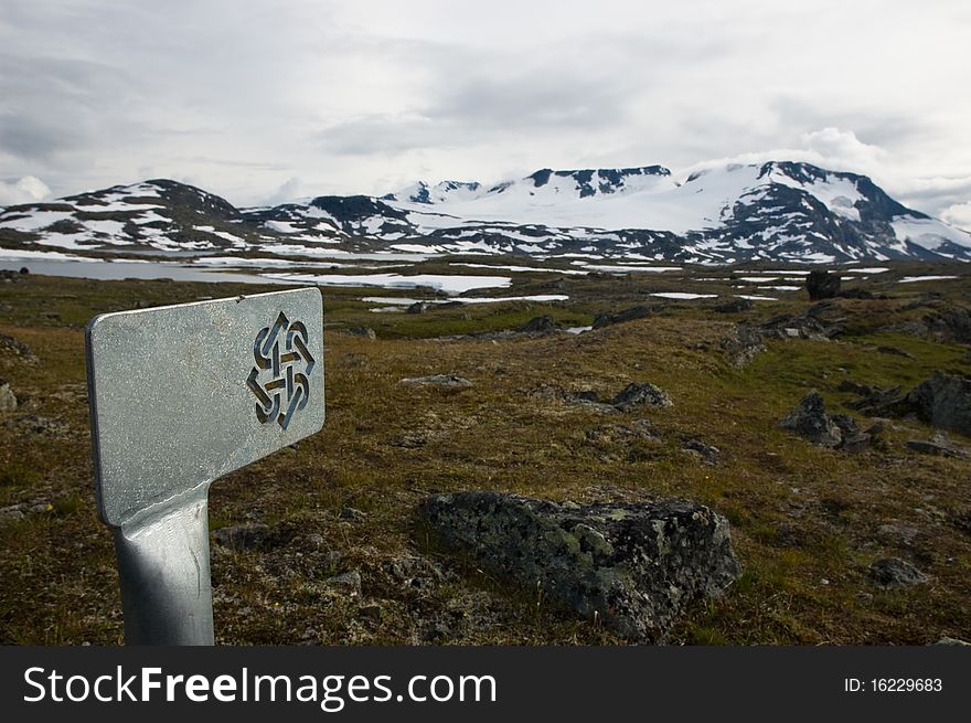 Norwegian tourist sign with ornament, made of metal