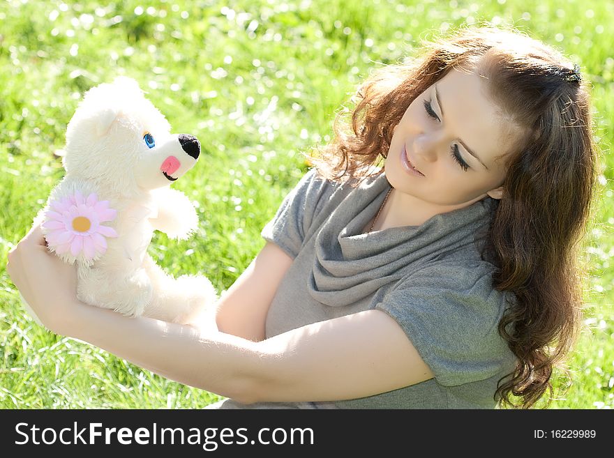 Young Girl Closeup Portret With Toy