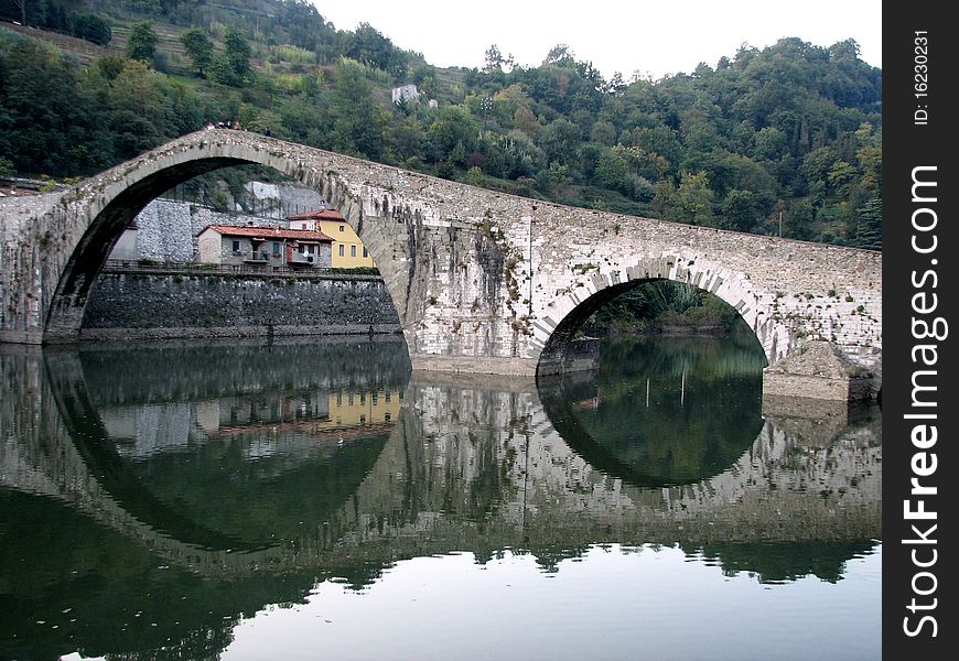 An ancient bridge in tuscany, italy. An ancient bridge in tuscany, italy