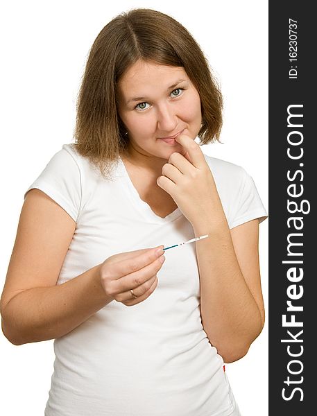 Adorable young woman with pregnancy test over white. Adorable young woman with pregnancy test over white