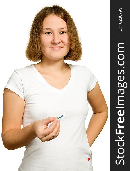 Adorable woman showing affirmative pregnancy test over white. Adorable woman showing affirmative pregnancy test over white