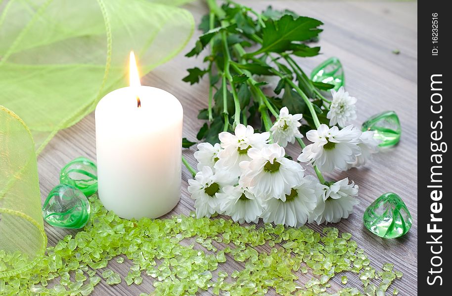 Bath salt with candle and flower