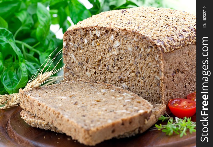 Healthy bread on wooden board closeup