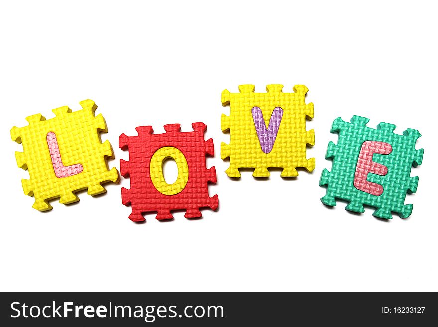 Letters puzzle from colorful plastic blocks. Letters puzzle from colorful plastic blocks
