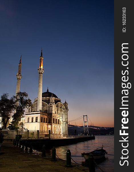 Traditional Ortakoy mosque composition with Bosphorus Bridge