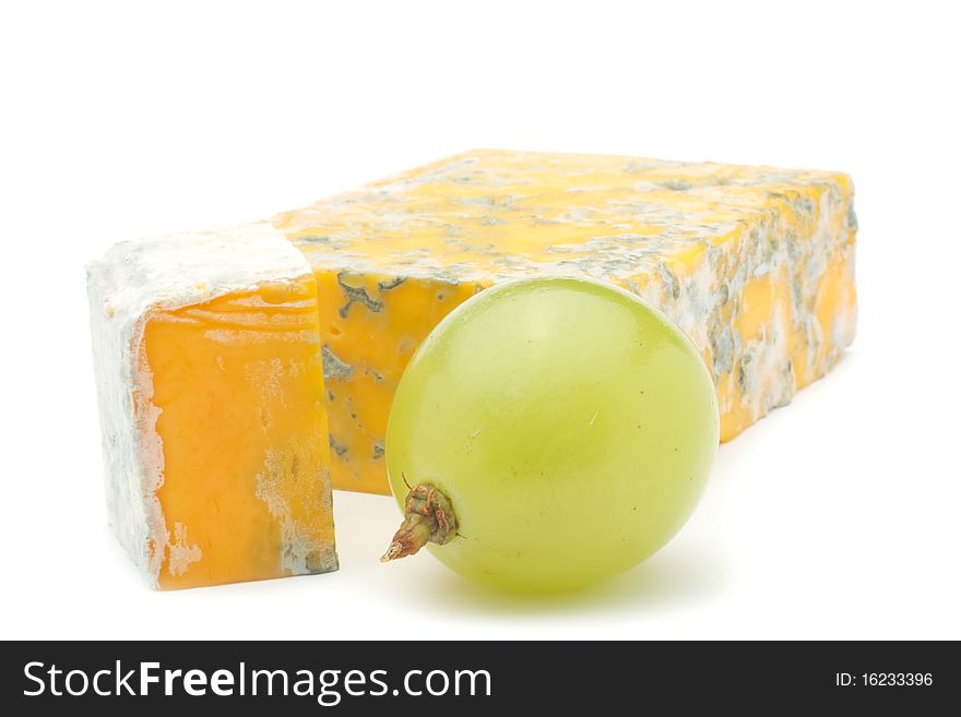 Cheese and piece with grape