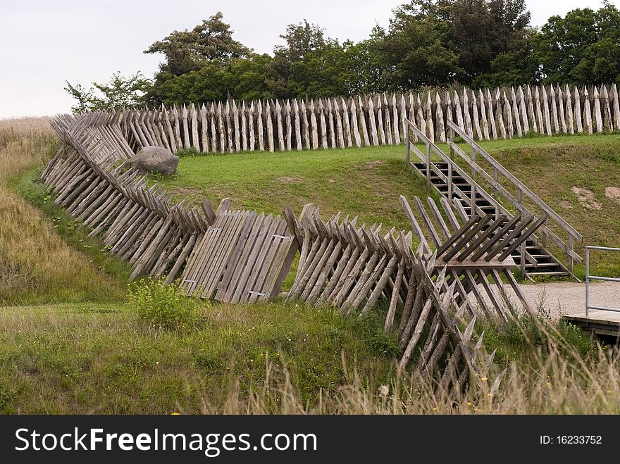 The reconstructed fortifications at Dybboel Banke in Denmark. Wooden palisades all over. The reconstructed fortifications at Dybboel Banke in Denmark. Wooden palisades all over.