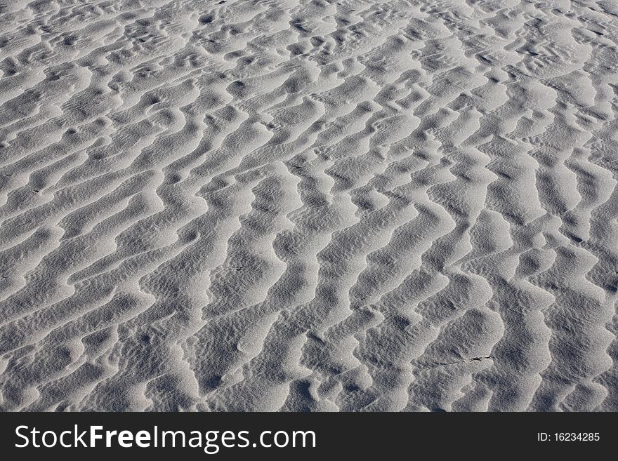 Texture of white sand dunes