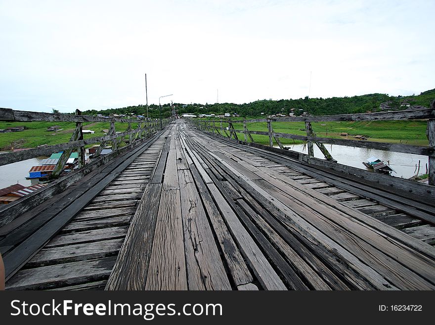 Walking at the longest wooden bridge in Thailand. Walking at the longest wooden bridge in Thailand