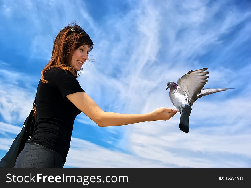 Girl Feeds The Dove
