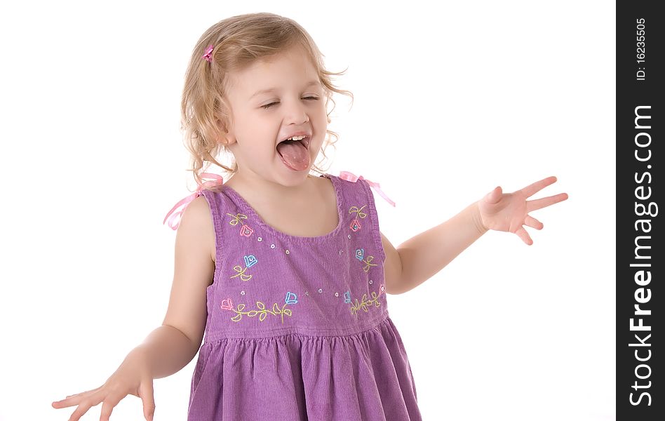 Fretful little girl wearing a purple dress screaming and standing on white background. Fretful little girl wearing a purple dress screaming and standing on white background